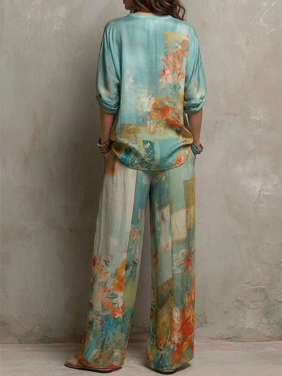 Chiara | Elegant floral print set with wide trousers Front