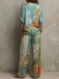 Chiara | Elegant floral print set with wide trousers Front