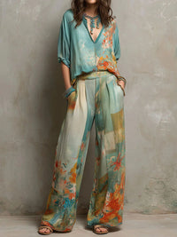Chiara | Elegant floral print set with wide trousers Hero