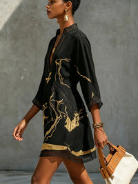Donatella | Mini dress in black with golden marble print and crochet lace Detail