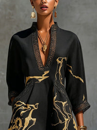 Donatella | Mini dress in black with golden marble print and crochet lace Front