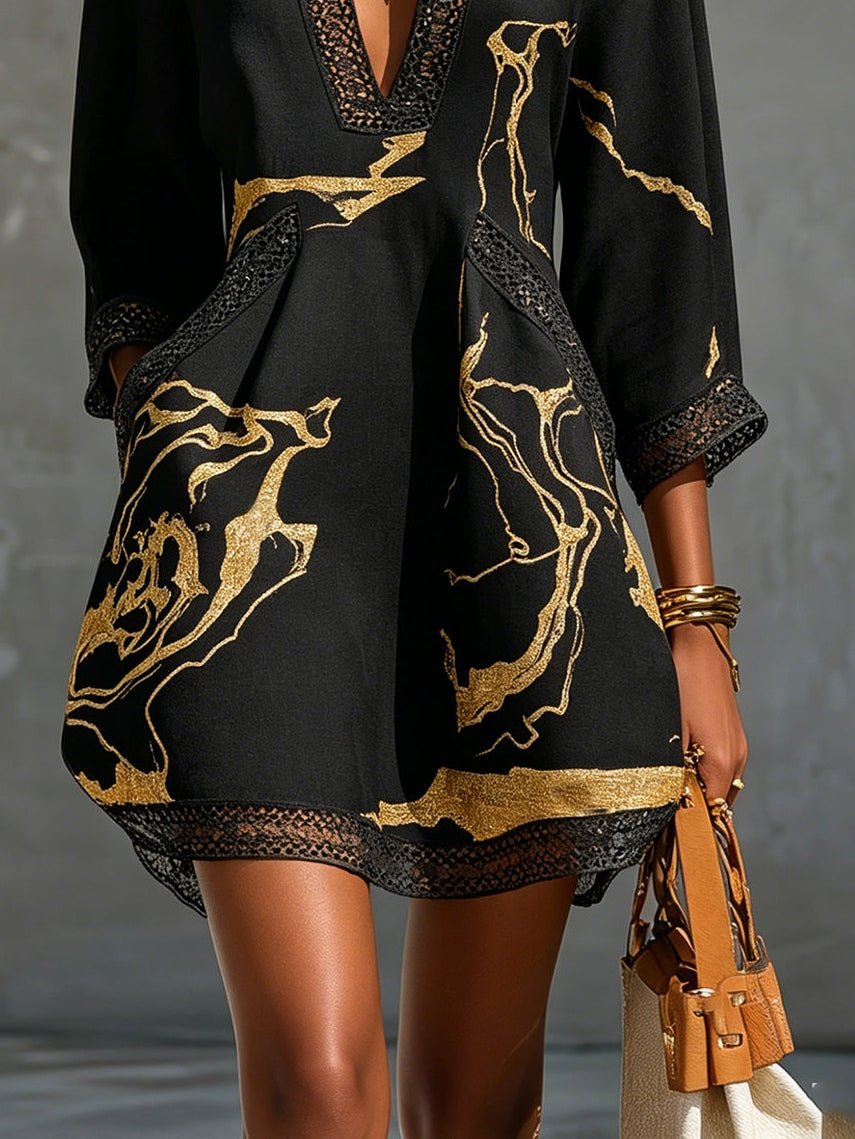 Donatella | Mini dress in black with golden marble print and crochet lace Side